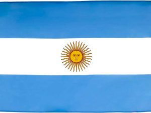 A photo of the Argentinian flag, a horizontal triband of light blue, white, and light blue with the Sun of May in the center.